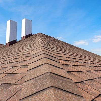 Residential roof with brown asphalt shingles